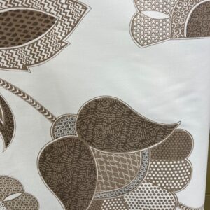 C83 - Curtaining Patchwork Pepper - Large Tan Flowers on a crisp white 100% Polyester Curtaining - 142cm wide - $15.00 per mtr