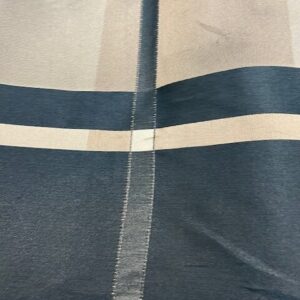 C195 - Curtaining - Tan, Black and Brown Tartan on a Taffeta Curtaining - 142cm wide - 100% Polyester - $15.00 per mtr
