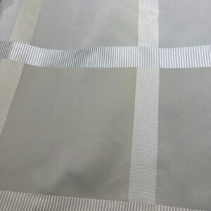 C202 - Curtaining - Cream on Cream Tartan with a ribbon running though out - 100% Polyester - 150cm wide - $15.00 per mtr