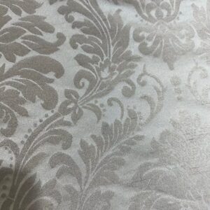 C206 - Curtaining - Shiny Florette in Tan on a lighter Tan Background - 150cm wide - 100% Polyester - $15.00 per mtr