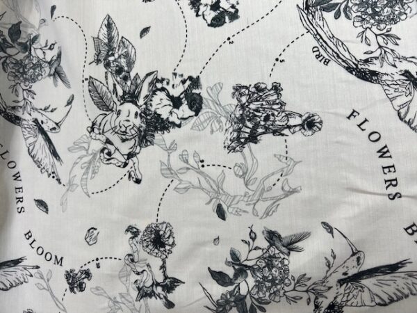 P153 - Cream 100% Polyester with Birds, Bunnies and Flowers - 150cm wide - $18.00 per mtr