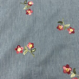 Chambray - DC12 - Embroidered Flowers on Mid Blue with a Small White Pinstripe - Light weight Denim - 100% Cotton- 145cm wide - $24.00 per mtr