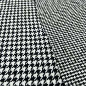 W39 -  Wool / Blend Jacketing - Double Thickness - Reversible - Large Black and White Houndstooth - 8mm -   with small Houndstooth on reverse 5mm- 20% Wool / 80% Polyester Jacketing - 153cm wide - $49.00 per mtr