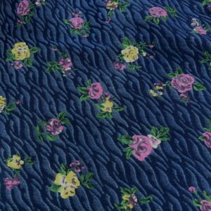 DC32 - Denim - Patterned - Stretch - Dark Navy with Tiny Yellow and Pink flowers on a wavy lighter blue background - 95% Cotton / 5% Spandex - 138cm wide - $24.00 per mtr