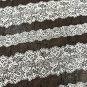 P468 - 100% Polyester Chiffon - Black with a Lace Grey Trim - 148cm wide - $18.00 per mtr