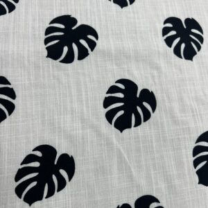 LC35 - Linen Blend - 6cm Black Rubber Tree Leaves on Off White Background - 55% Linen / 45% Cotton - 150cm wide - $26.00 per mtr
