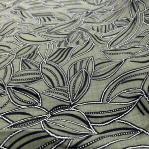 LC39 - Linen Blend - Soft Khaki with Stitch like Silhouette Leaves in Black and White - 55% Linen / 45% Cotton - 150cm wide - $26.00 per mtr