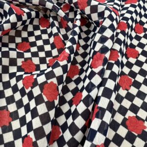 P265 - 100% Polyester -Chiffon - Checkers in White and Navy with small Red Roses- 145cm wide - $12.00 per mtr