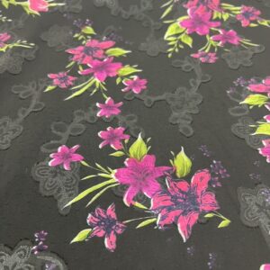 P240 - Georgette - 100% Polyester -Large Purple Lillies on Black Georgette with and overlay of Material Roses - 140m wide - $26.00 per mtr