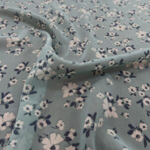 P224 - 100% Polyester - Georgette - "My Pick"- Soft Mint Green with clusters of off white and blue flowers- 150cm wide - $18.00 per mtr