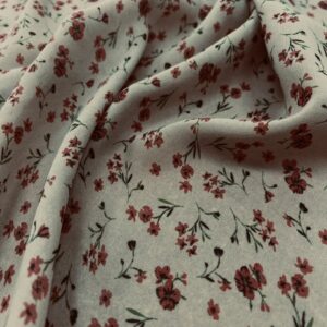 P260 - 100% Polyester - Soft Georgette - Brown with small clusters of Peach Flowers - 150cm wide - $16.00 per mtr