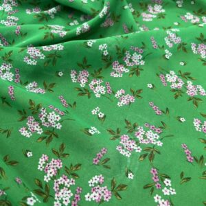 P293 - 100% Polyester - Chiffon - Emerald Green with clusters of Soft Pink Flowers - 150cm wide - $16.00 per mtr
