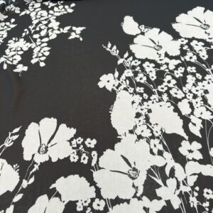 P296 - 100% Polyester - Soft Georgette - Panels 1.2m - Black with Large White Poppie like flowers - Border Print- 150cm wide - $21.00 per Panel