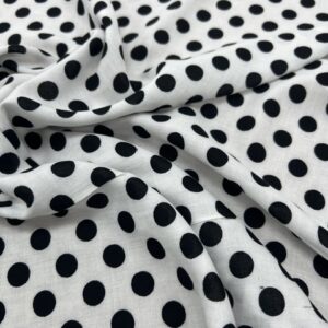 R114 - 100% Rayon -White with 5mm Black Spots - 145cm wide - $18.00 per mtr