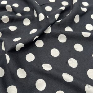 R115 - 100% Rayon -Black with 8mm White Spots - 145cm wide - $20.00 per mtr